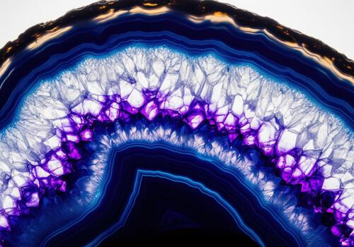Stunning macro detail of a translucent blue and purple agate geode slice photo