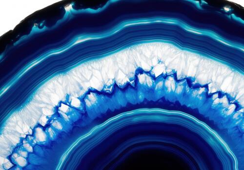 Deep blue and white banded agate crystal structure macro close up background photo