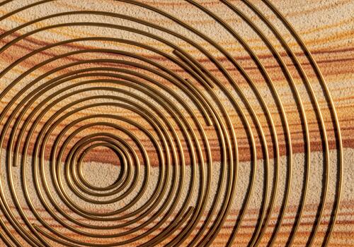 Golden brass wire arranged in a large abstract concentric circular spiral design photo