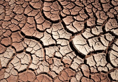 detallado ver de agrietado seco barro textura simbolizando global calentamiento y sequía foto