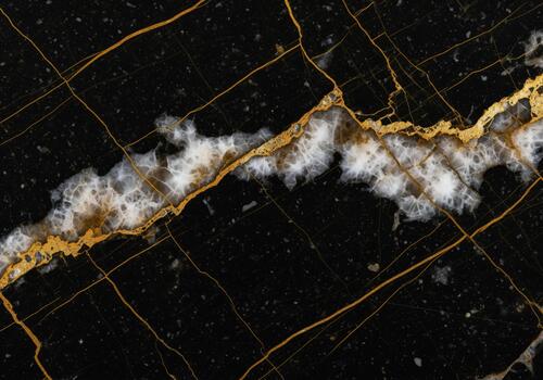 Abstract black marble texture with dramatic gold and white veining pattern. photo