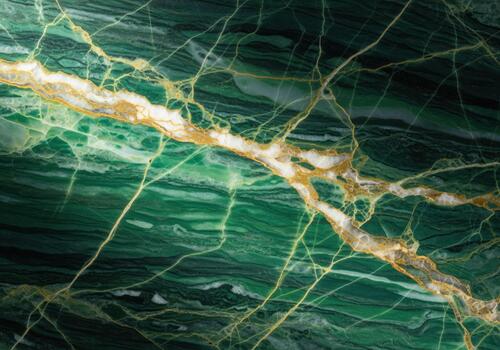 Luxurious polished green marble slab featuring intricate gold and cream veining pattern photo