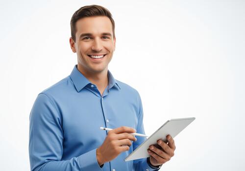 Confident young businessman smiling while using a digital tablet and stylus against a white background photo