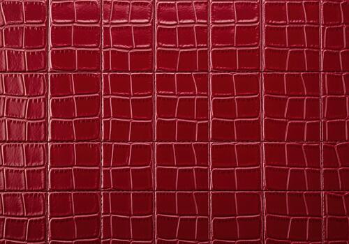 Red crocodile skin pattern with glossy surface and reptile texture photo