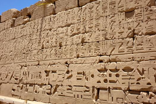 Exploring the Ancient Hieroglyphs and Bas Reliefs of Karnak Temple Complex in Egypt photo