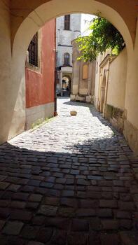 Discover Lvivs Charming Armenian Courtyard With Cobblestone Streets and Historic Architecture photo