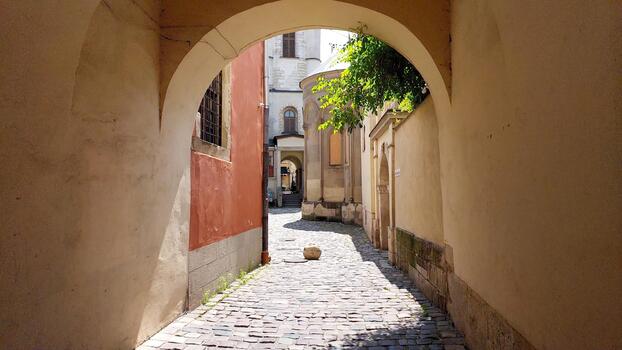 Discover Lvivs Serene Armenian Courtyard With Cobblestone Paths and Stunning Architecture photo