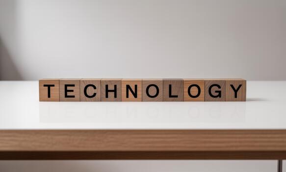 Technology word on wooden blocks on table photo