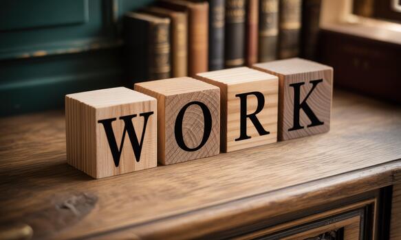 Wooden blocks spelling work on a desk photo