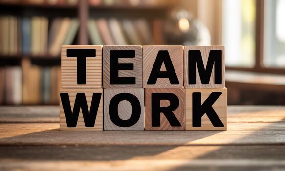 Teamwork concept with wooden blocks on a table photo