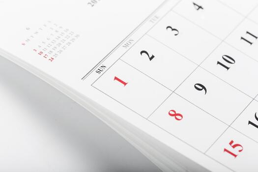 Calendar design showing days of the week with a focus on the first day of the month photo