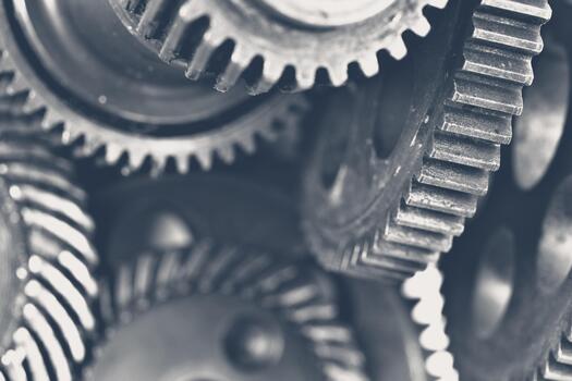 Close-up view of interlocking gears in motion creating mechanical harmony and efficiency photo