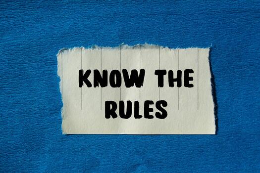 Know the rules message written on ripped torn paper background. Conceptual Know the rules symbol. Copy space. photo