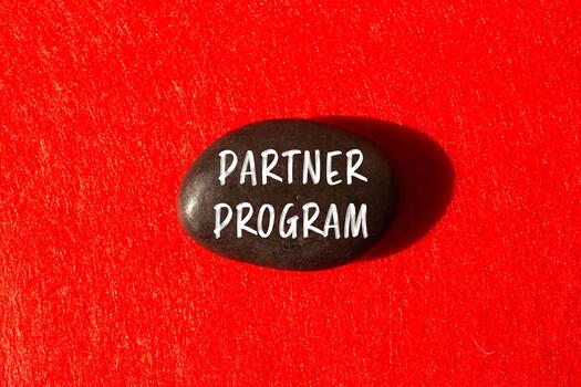 Partner program message written on stone background. Conceptual Partner program symbol. Copy space. photo