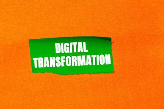 Digital Transformation message written on ripped torn paper background. Conceptual Digital Transformation symbol. Copy space. photo
