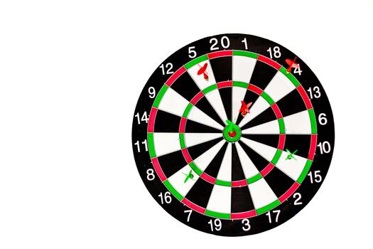 Dartboard with multiple darts hitting the target, symbolizing accuracy and achievement in game photo