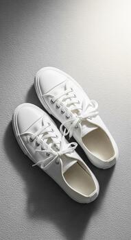 Minimal Product Mockup White Canvas Sneakers on a Clean Background, Ideal for Branding Display, Advertising, or Fashion Apparel Showcase with Studio Lighting and Modern Aesthetic photo