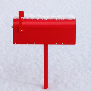 Red mailbox covered with snow photo