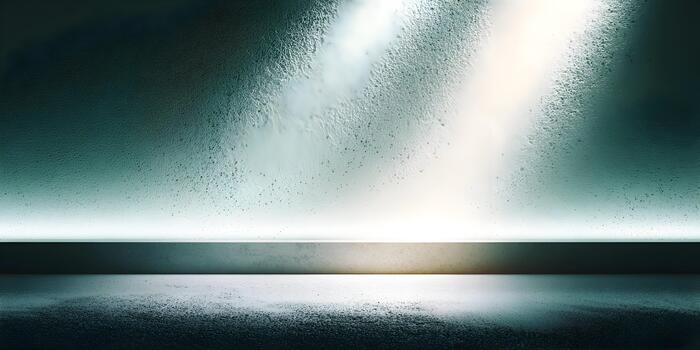 An illuminated textured teal wall and floor create a sleek abstract background photo