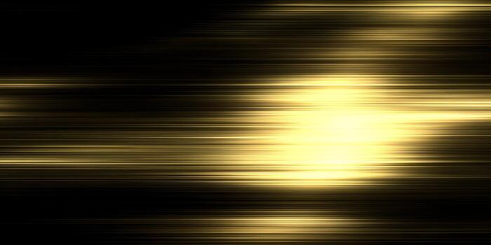 Dynamic golden streaks of light glow intensely against a dark backdrop photo