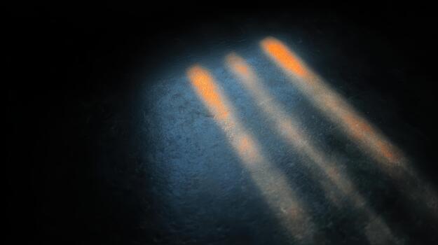 Bright lights create dramatic shadows in dark space photo