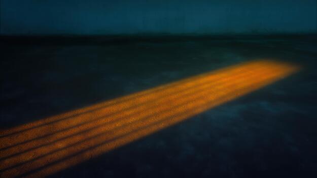 Light beams illuminate dark floor in a quiet space photo