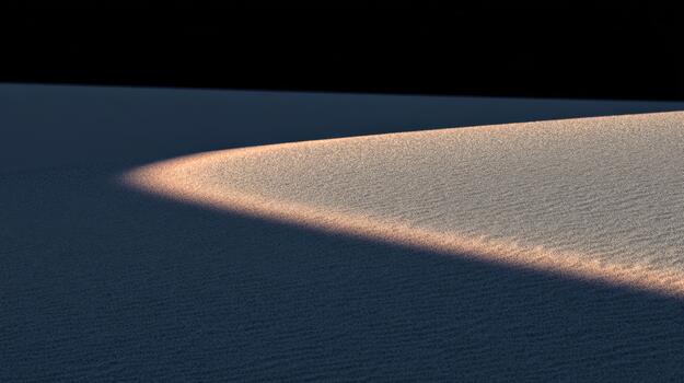Soft light on desert sand during twilight photo