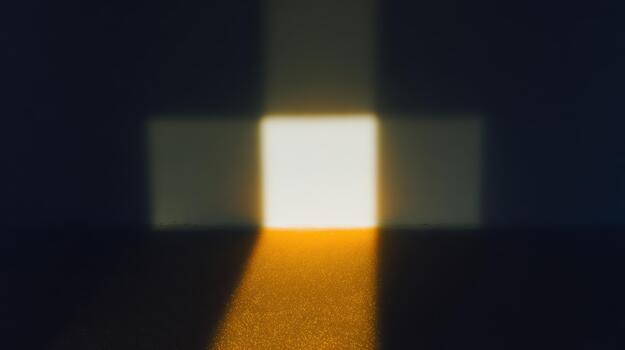 Light creates a unique shadow pattern in a dark space photo