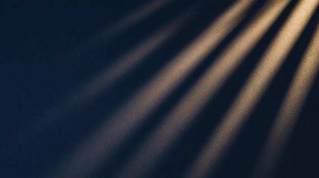 Soft light rays create a serene atmosphere on dark surface photo