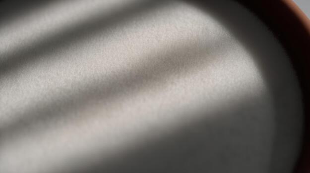 Shadows and textures on a surface in soft sunlight photo
