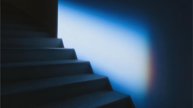 Light casting shadows on a staircase at dusk photo