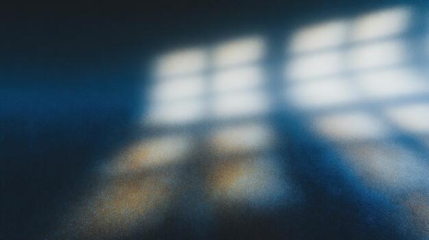 Sunlight casting shadows through a window at dusk photo