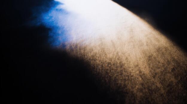 Light beams create a mystical atmosphere in the dark photo