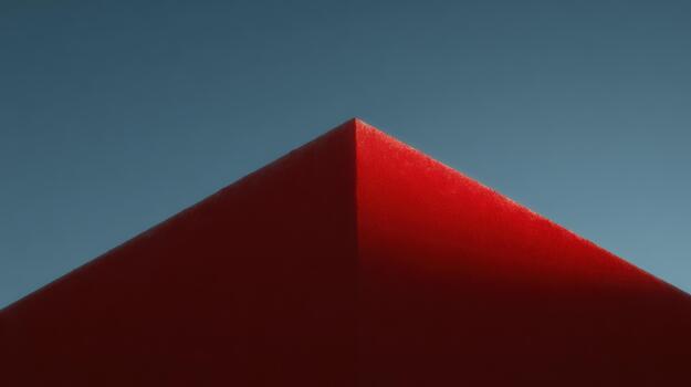 Abstract red structure against clear sky during daytime photo
