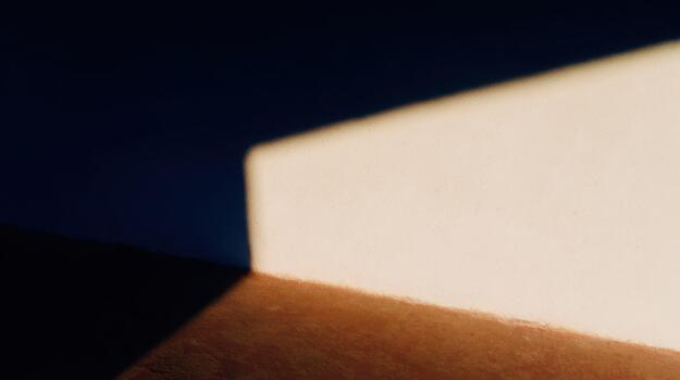 Shadows and light create patterns on textured surfaces photo