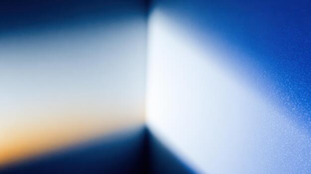 Shades of blue light creating dynamic patterns on the wall photo