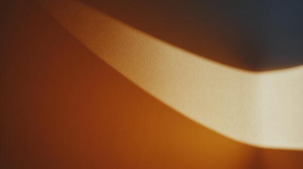 Soft light creating abstract shapes on wall surface photo