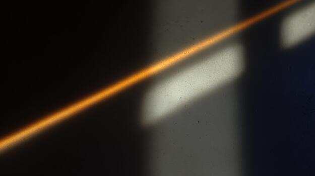 Light patterns create a warm glow in a quiet room photo