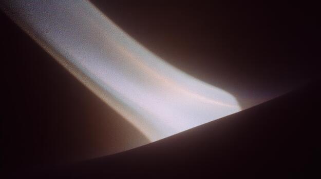 Illuminated abstract light pattern on dark surface photo