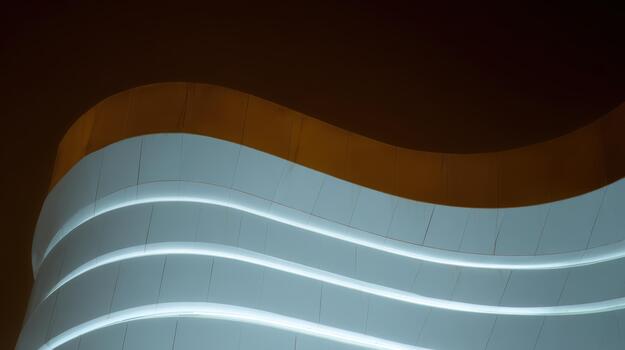 Modern architecture features waves and lights at night photo