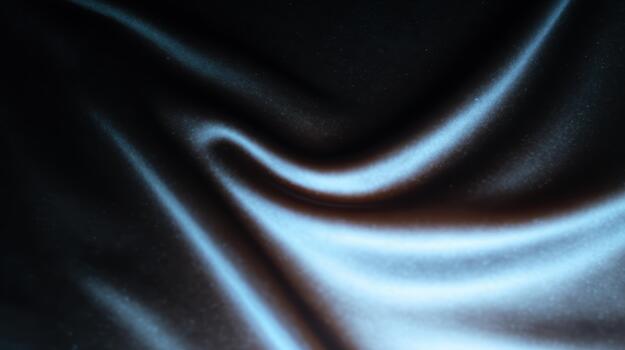 Smooth, flowing black fabric with soft texture photo