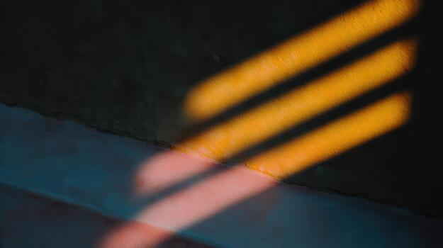 Bright stripes of light create patterns on the floor photo