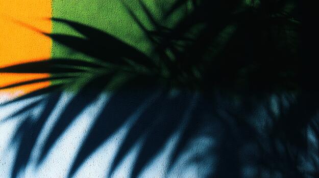 Shadow patterns on a colorful wall in the afternoon sun photo