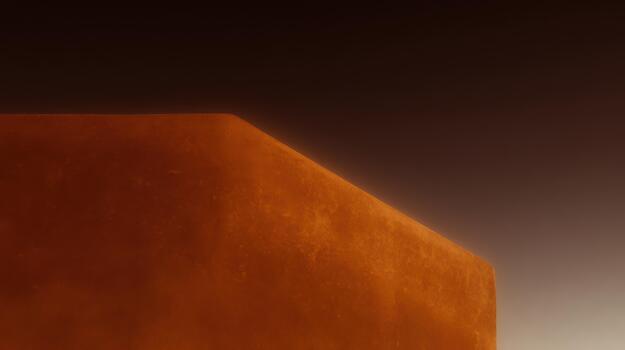 Sunset light on textured wall in a desert setting photo