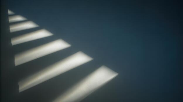 Shadows create patterns on the surface in soft light photo