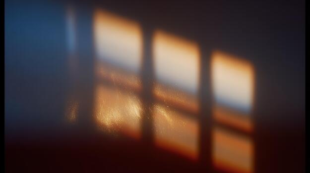 Warm sunlight casting reflections on a wall photo