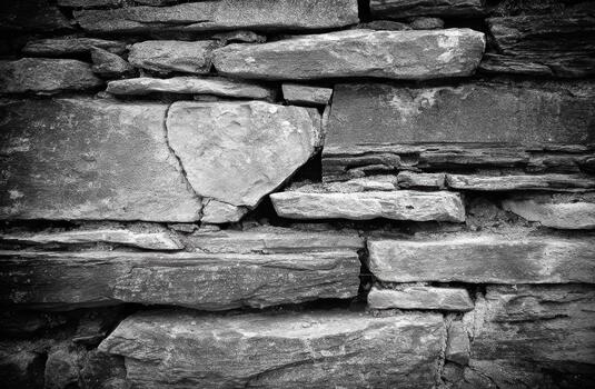 Textured stone wall showcasing natural patterns and tones photo
