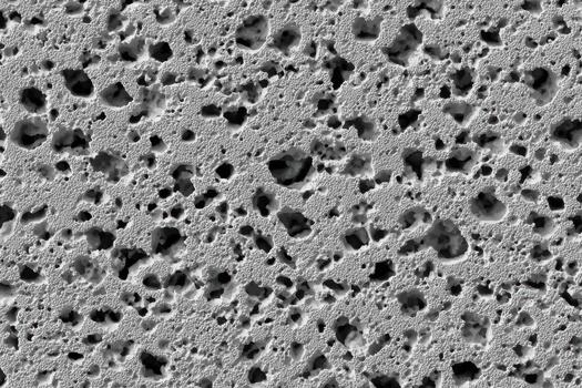 Close-up view of textured surface showcasing porous material photo