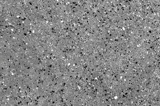 Textured surface with small stones and gravel pieces photo