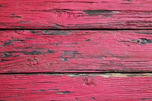 Red wooden texture with weathered grooves and marks photo